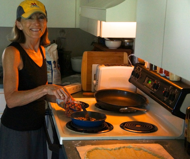 patricia with the beginnigs of pear gorgonzola pizza