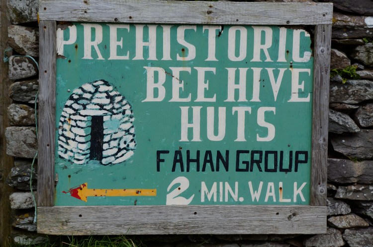 hive huts sign on the half route