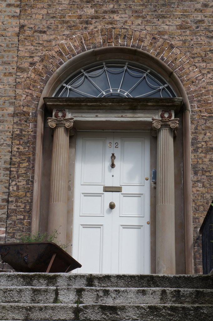 Dublin - door to Patrick Kavanagh's flat on Pembroke St. Dublin