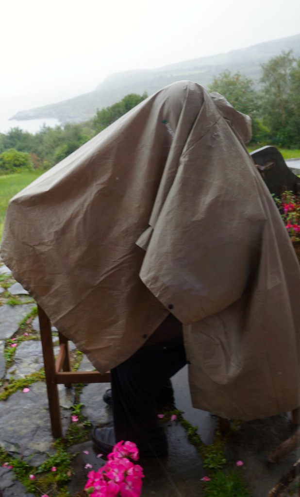 blogging under frogtog in the rain to get a signal