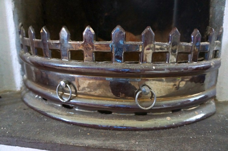 metal work on fire grate metal work on fire grate