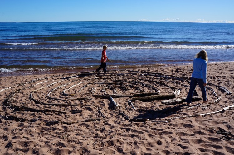 Patricia and Eli walking the labyrinth