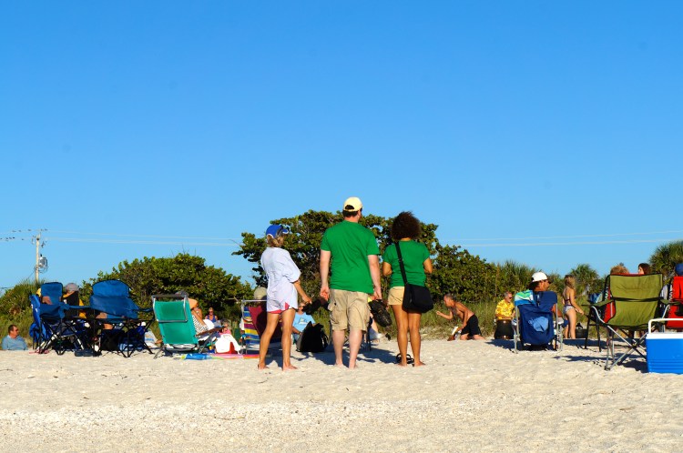 Patricia, Peter, & Norida, on the circle listening, watching, and moving to the beat
